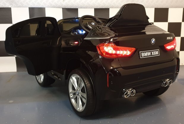 BMW X6 zwart metallic (1 persoons)